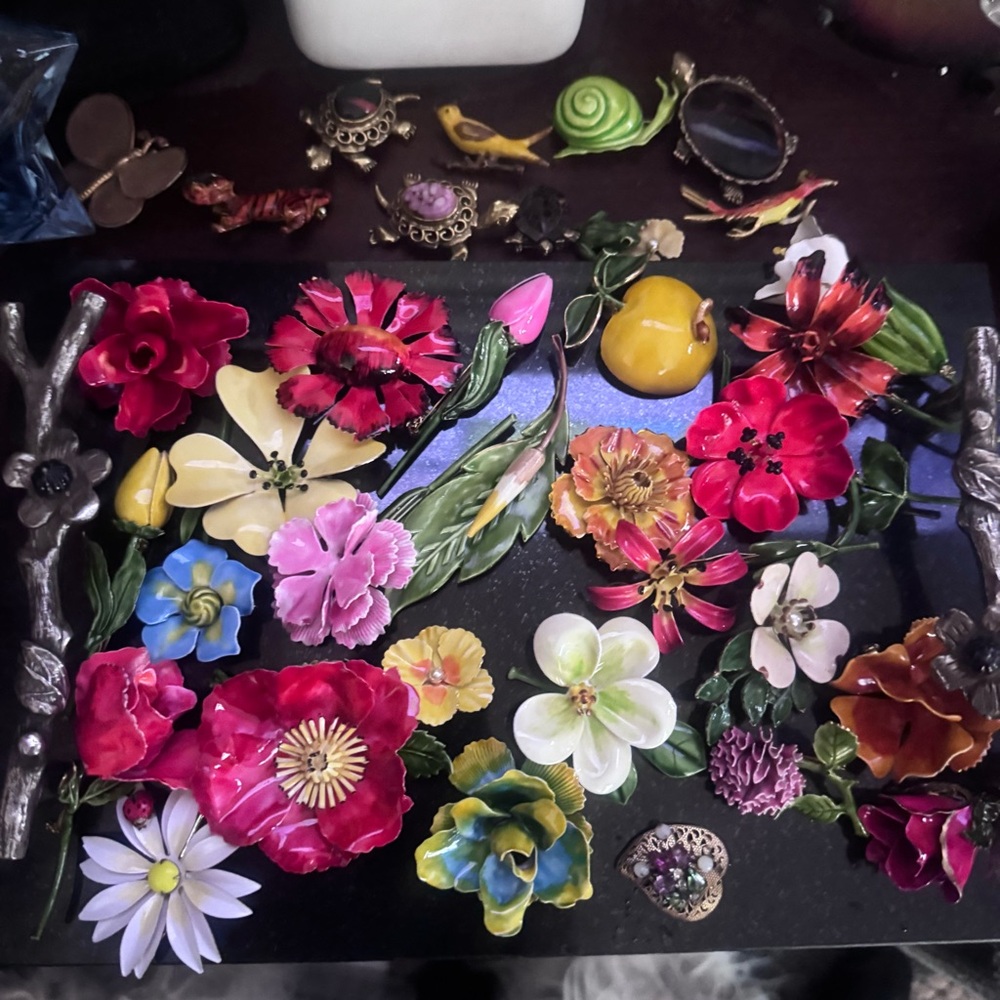 Collection of Original by Robert brooches
